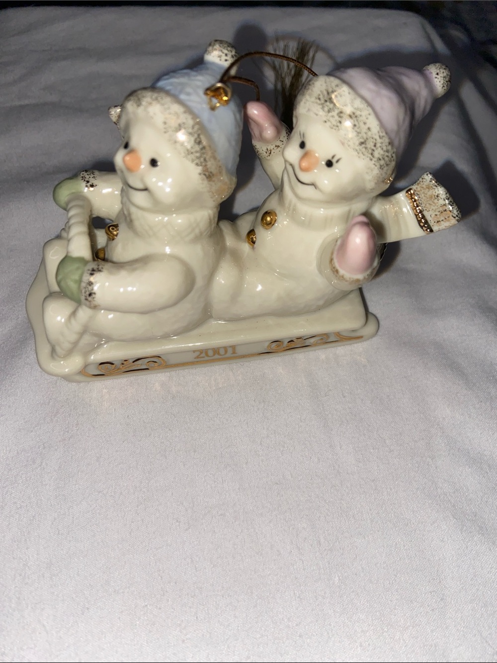 Lenox Ceramic Snowmen Sled Ornament in White with Blue & Pink Hats